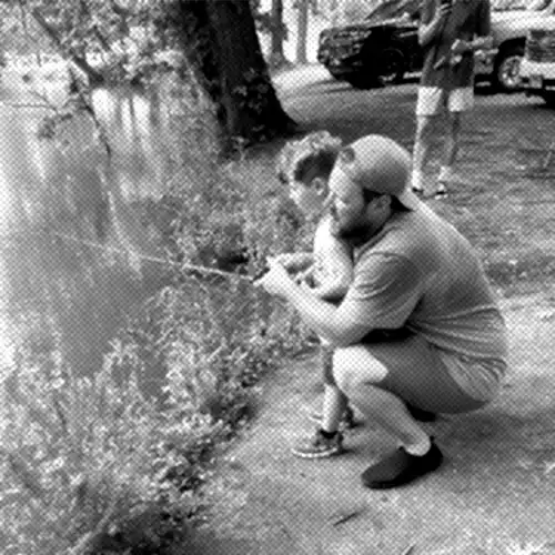Helping Jackson catch Bluegill at Drakes Creek Park in TN.