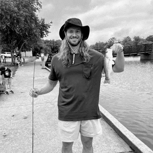 Thomas fishing in the park.
